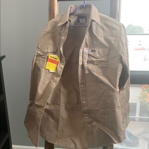 Wrangler Khaki Button-Up Shirt
Have 3 shirts for sale. All 3 I’m selling for $35